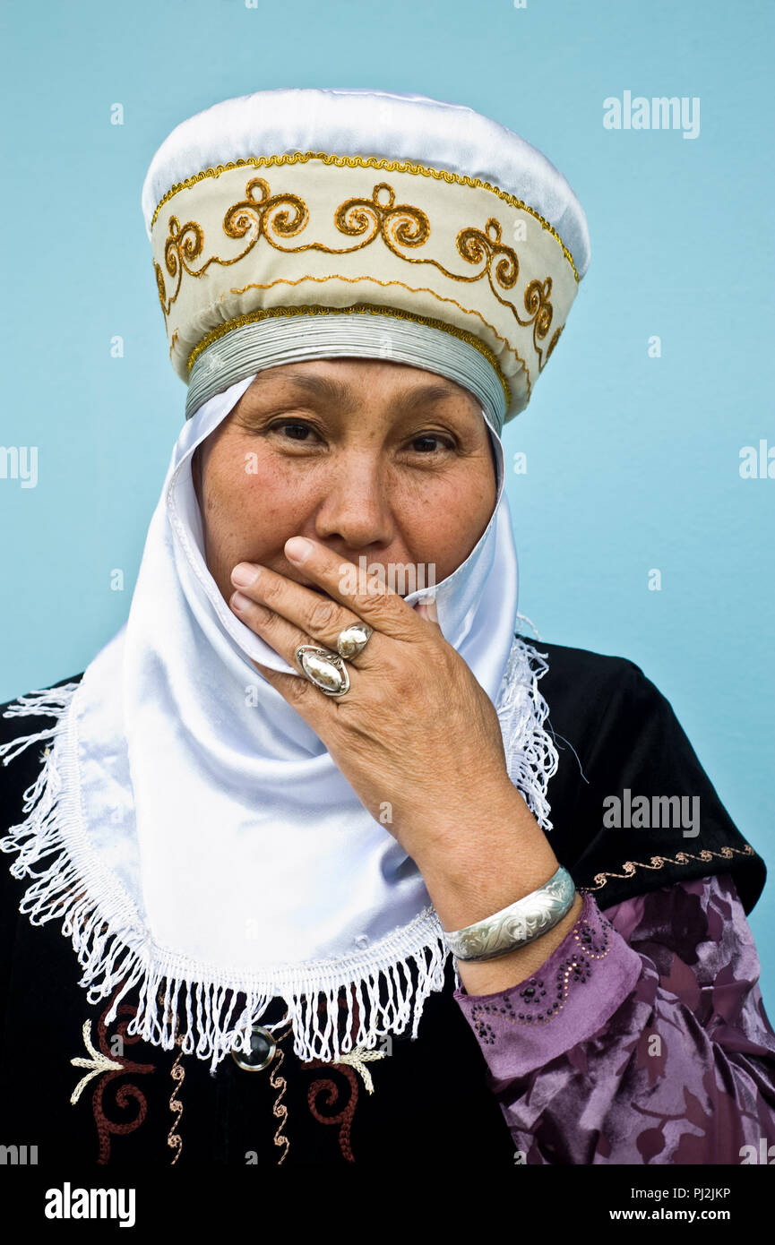 Traditionally dressed Kyrgyz woman ( Kyrgyzstan) Stock Photo
