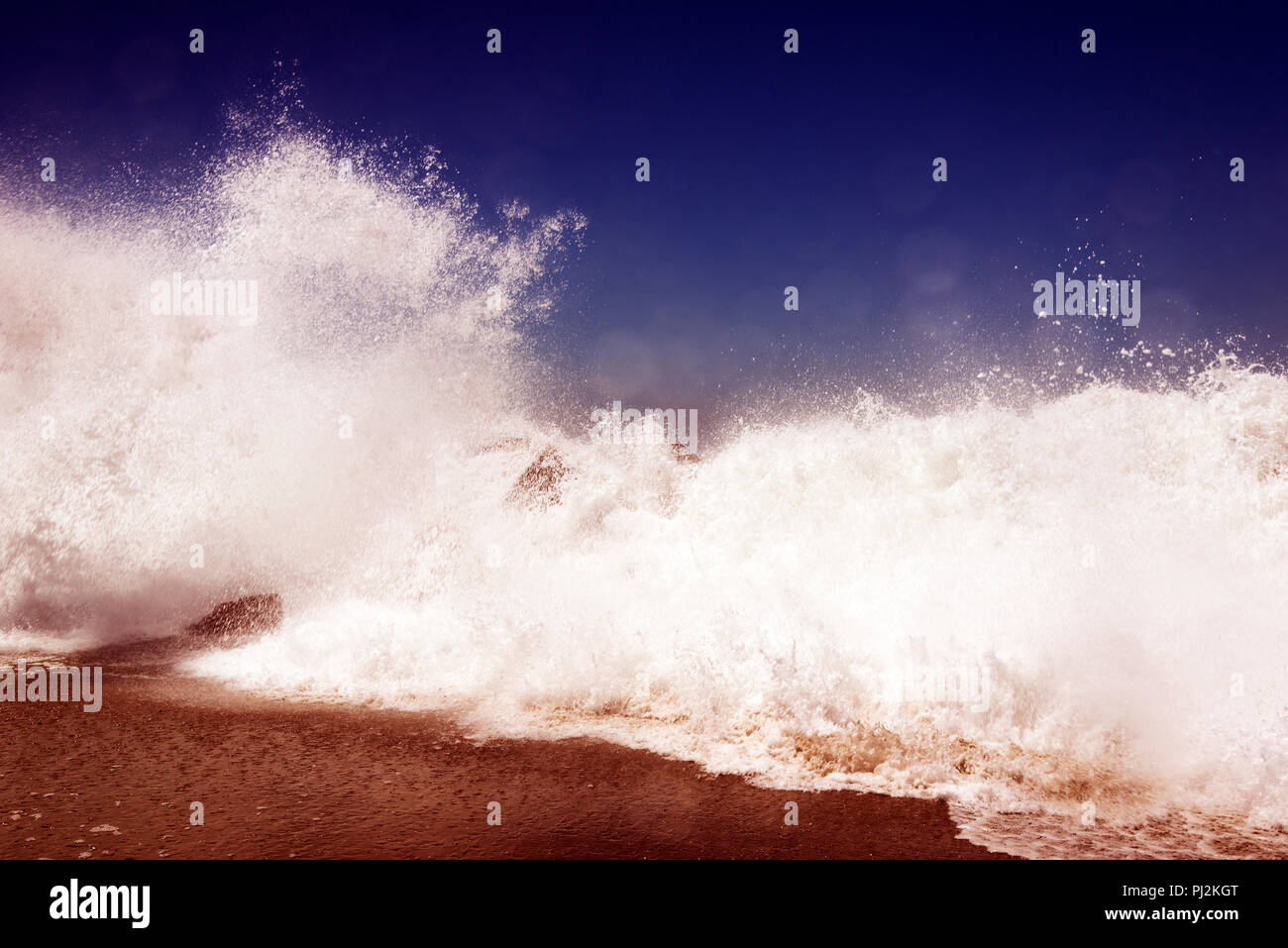 Huge waves breaking at Venice beach, California in summer time Stock