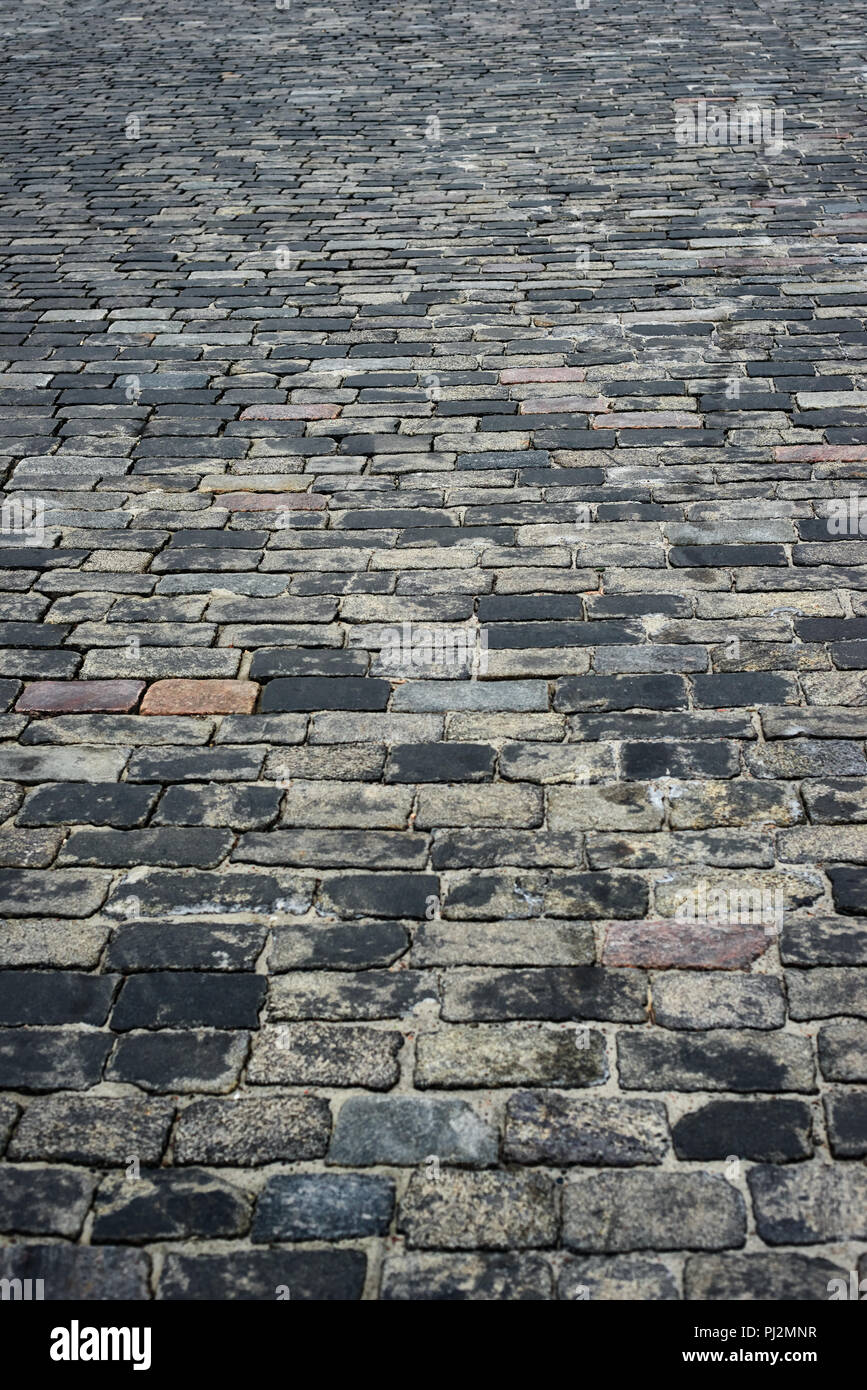 old cobblestone road for background or texture Stock Photo - Alamy