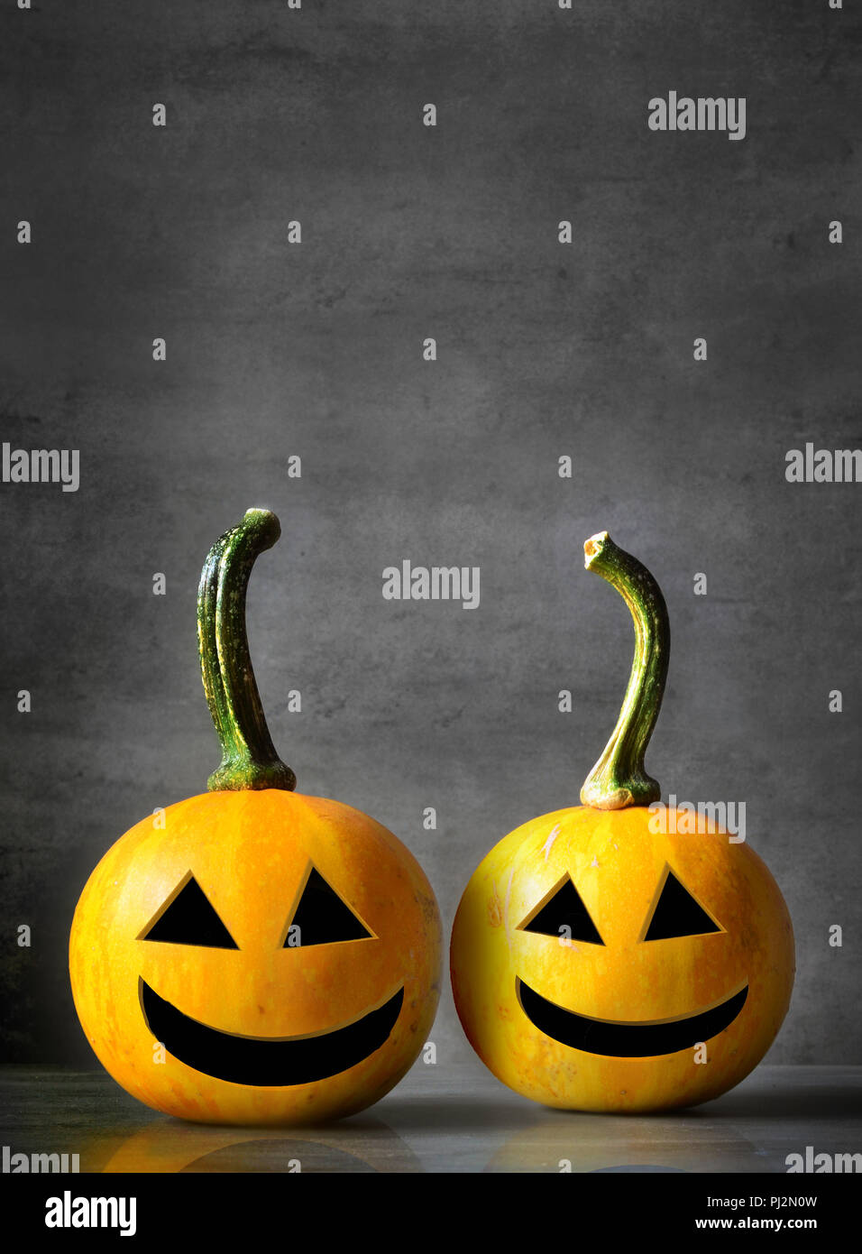 Scary Halloween pumpkins isolated on a black background. Scary smiling ...