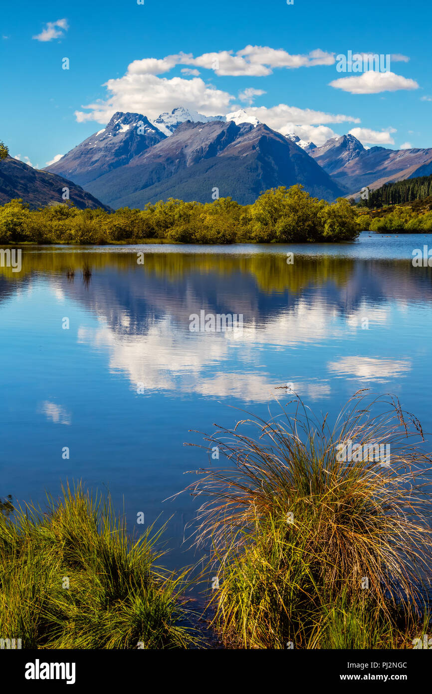 At the northern end of Lake Wakatipu is the small village of Glenorchy with the Glenorchy Lagoon and a beautiful view of the Southern Alps of New Zeal Stock Photo