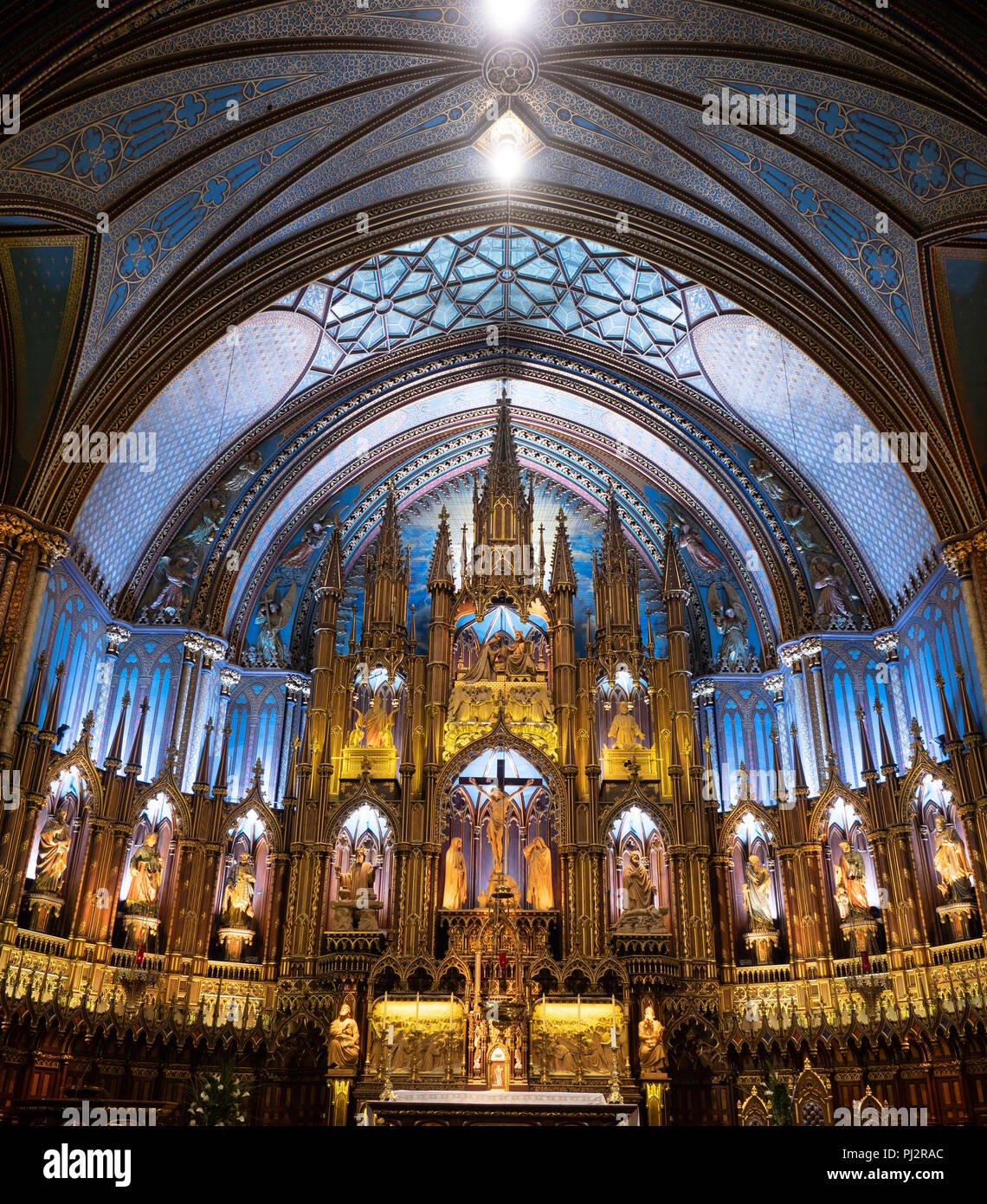 The Ornate Altar With Statues In Niches Surrounding It And Blue
