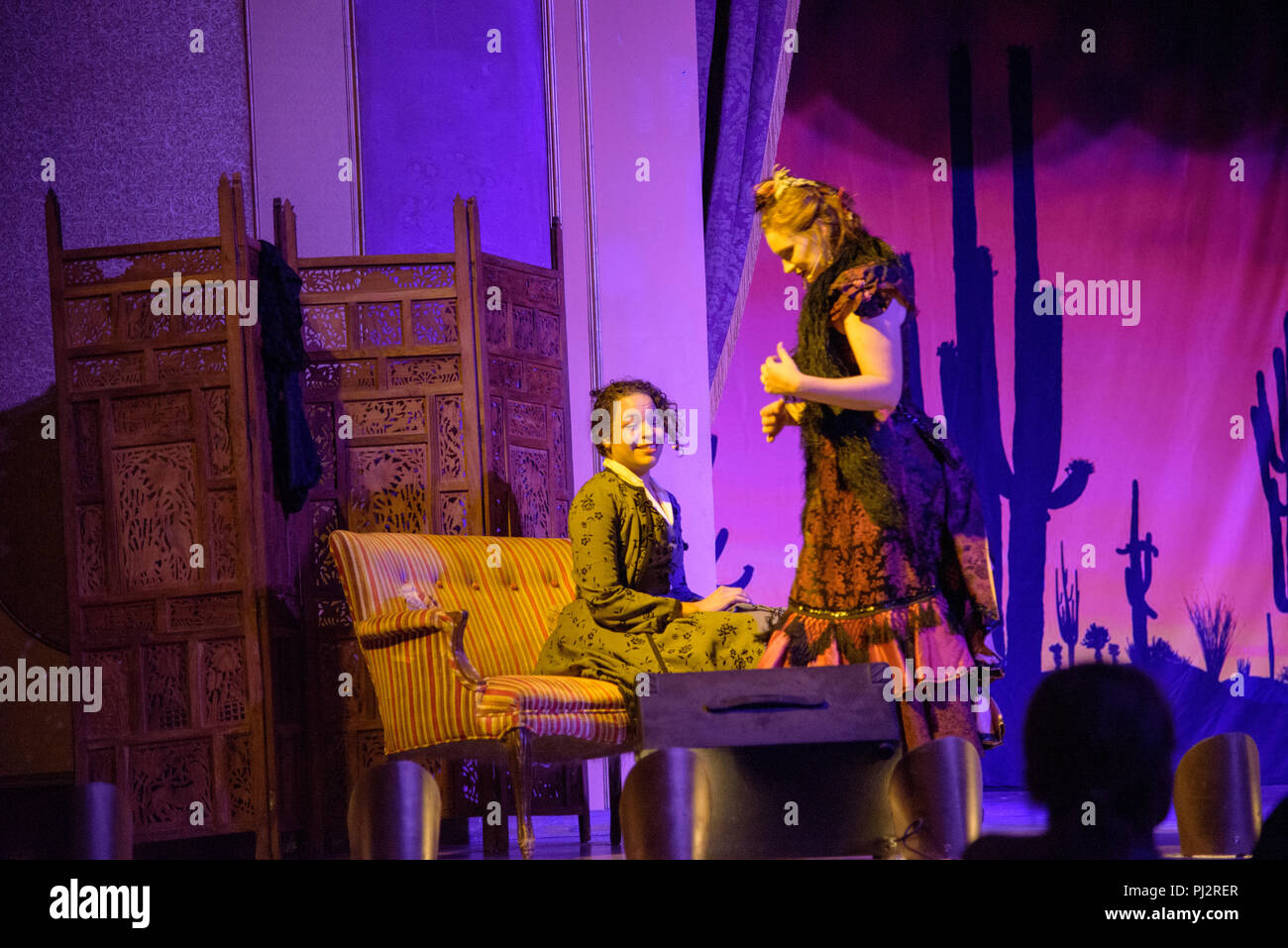 Actors on stage at the Grand Palace Hotel and Saloon in Old Tucson