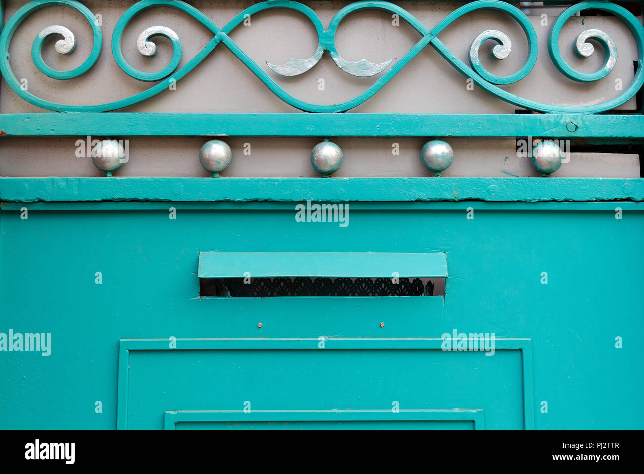 Detail of iron gates with decorative elements different shapes, close