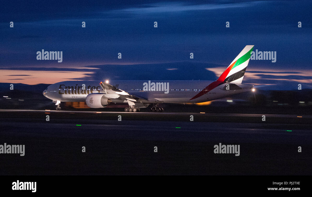 Emirates Airlines Boeing 777 flight to Dubai departs Glasgow International Airport, Renfrewshire, Scotland - 8th September 2017 Stock Photo