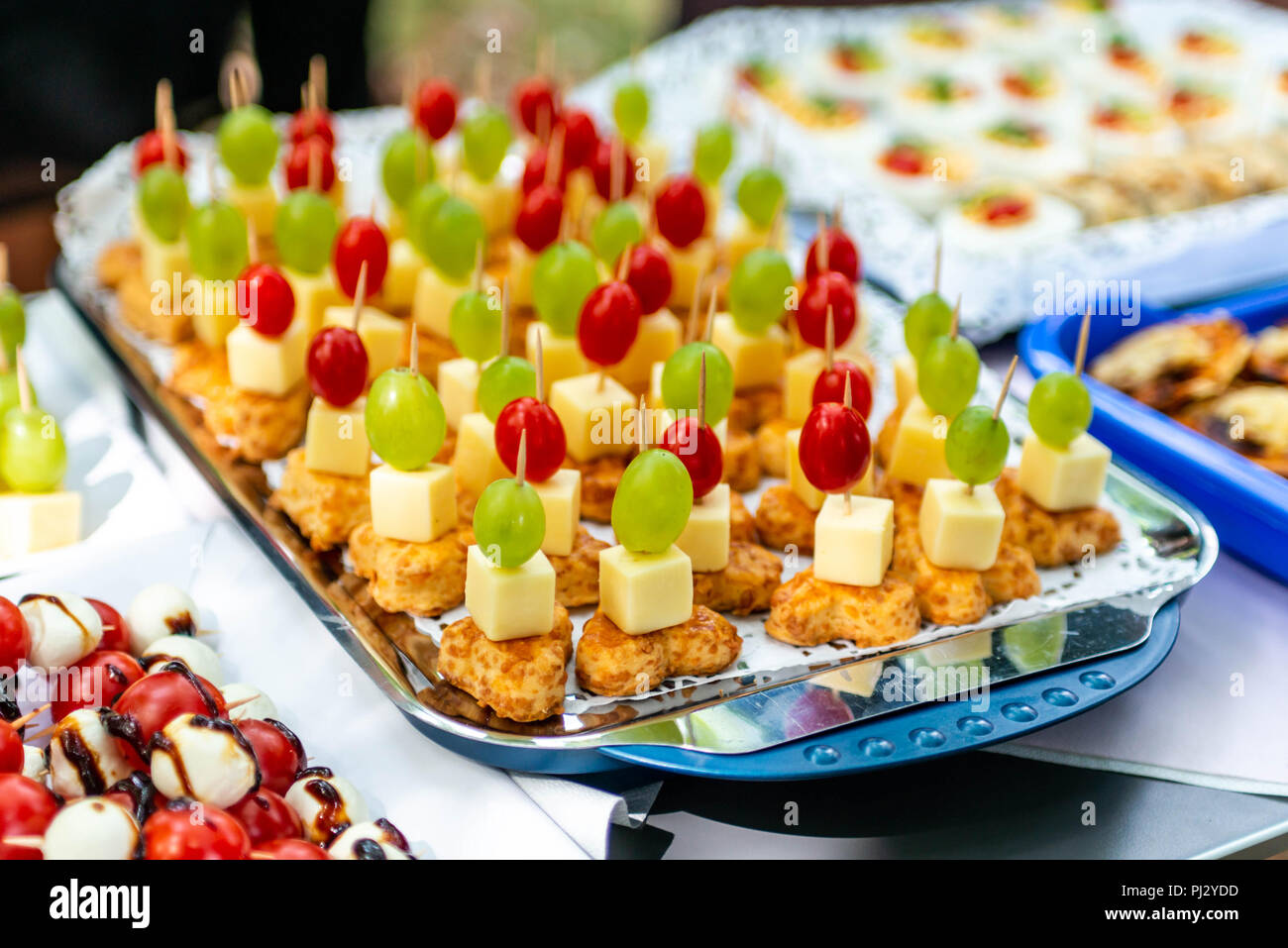 buffet Assortment of canapes. Banquet service. catering food, snacks with  mixed fingerfood appetizers Stock Photo - Alamy