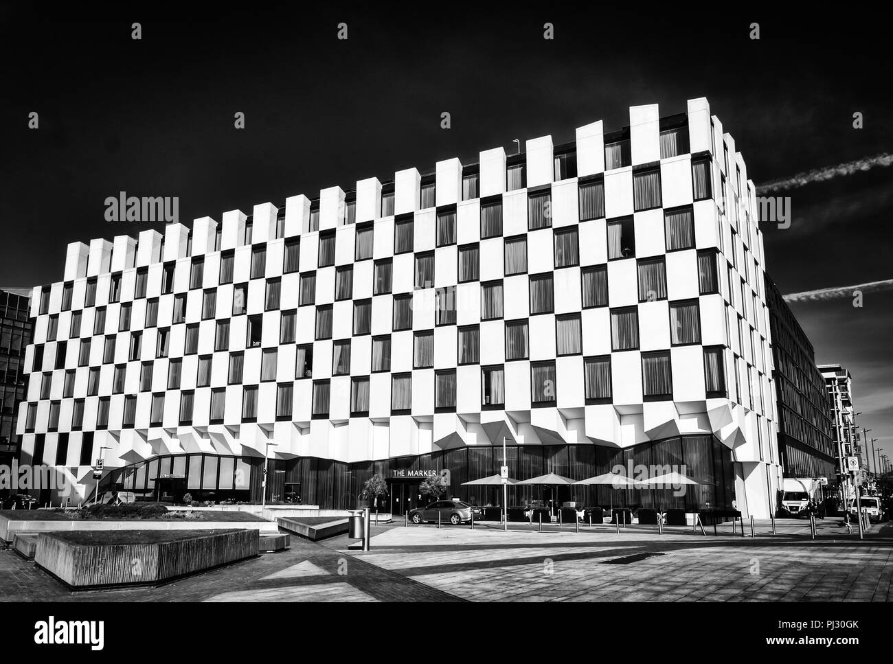 Dublin, Ireland, March 2018, The Maker hotel with its chequerboard facade in Grand Canal square Stock Photo