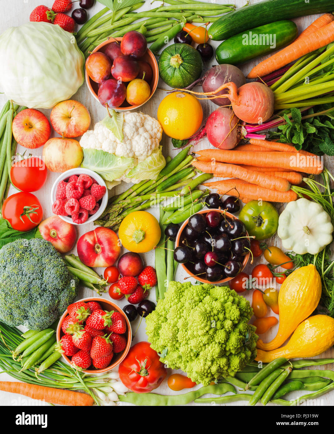 Summer fruits vegetables berries background, apples cherries peaches