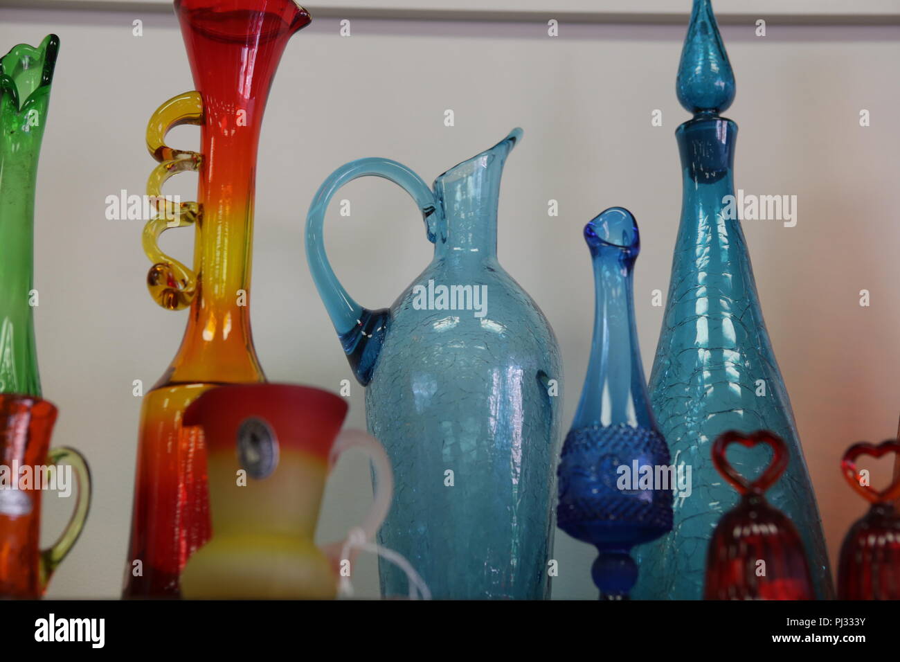 multiple colored glass vases Stock Photo