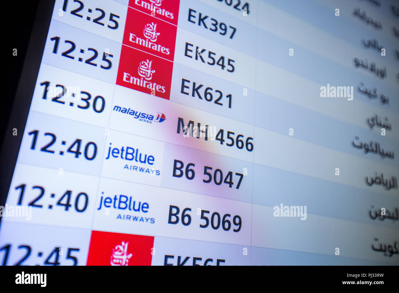 Information board Dubai International Airport Stock Photo