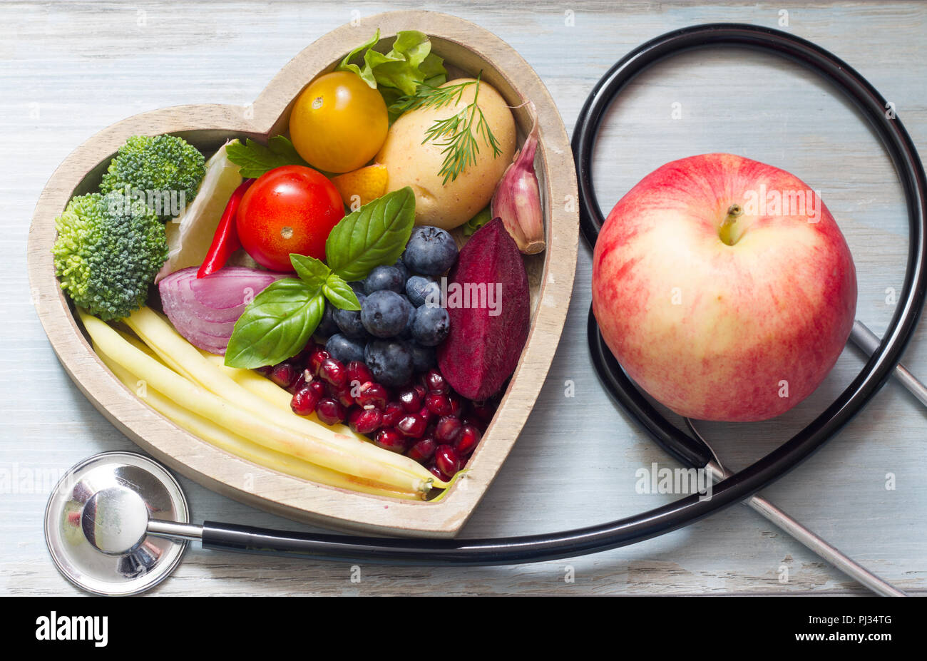 Healthy food in heart diet concept with stethoscope Stock Photo - Alamy