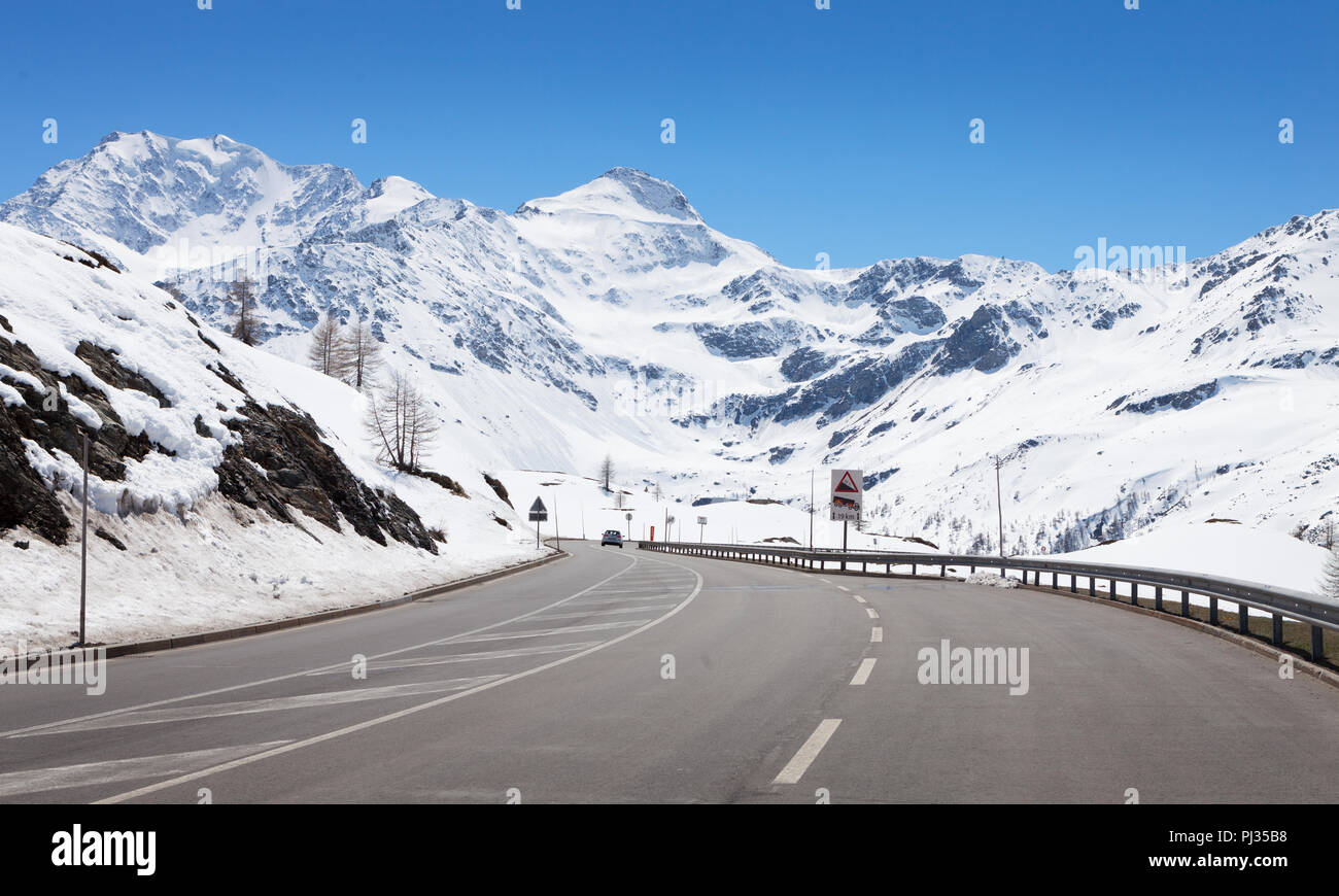 Mountain road in a sunny day.  Simplon Pass, Valais, Switzerland Stock Photo