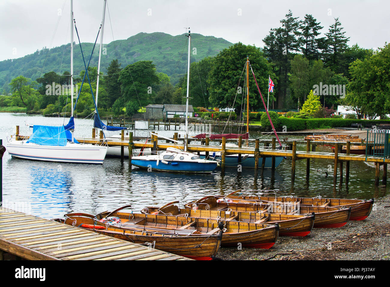 Boats in Bowness on Windermere, view of the lake and mountain on the