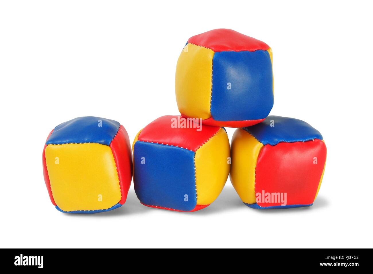 Four juggling balls on white background Stock Photo Alamy