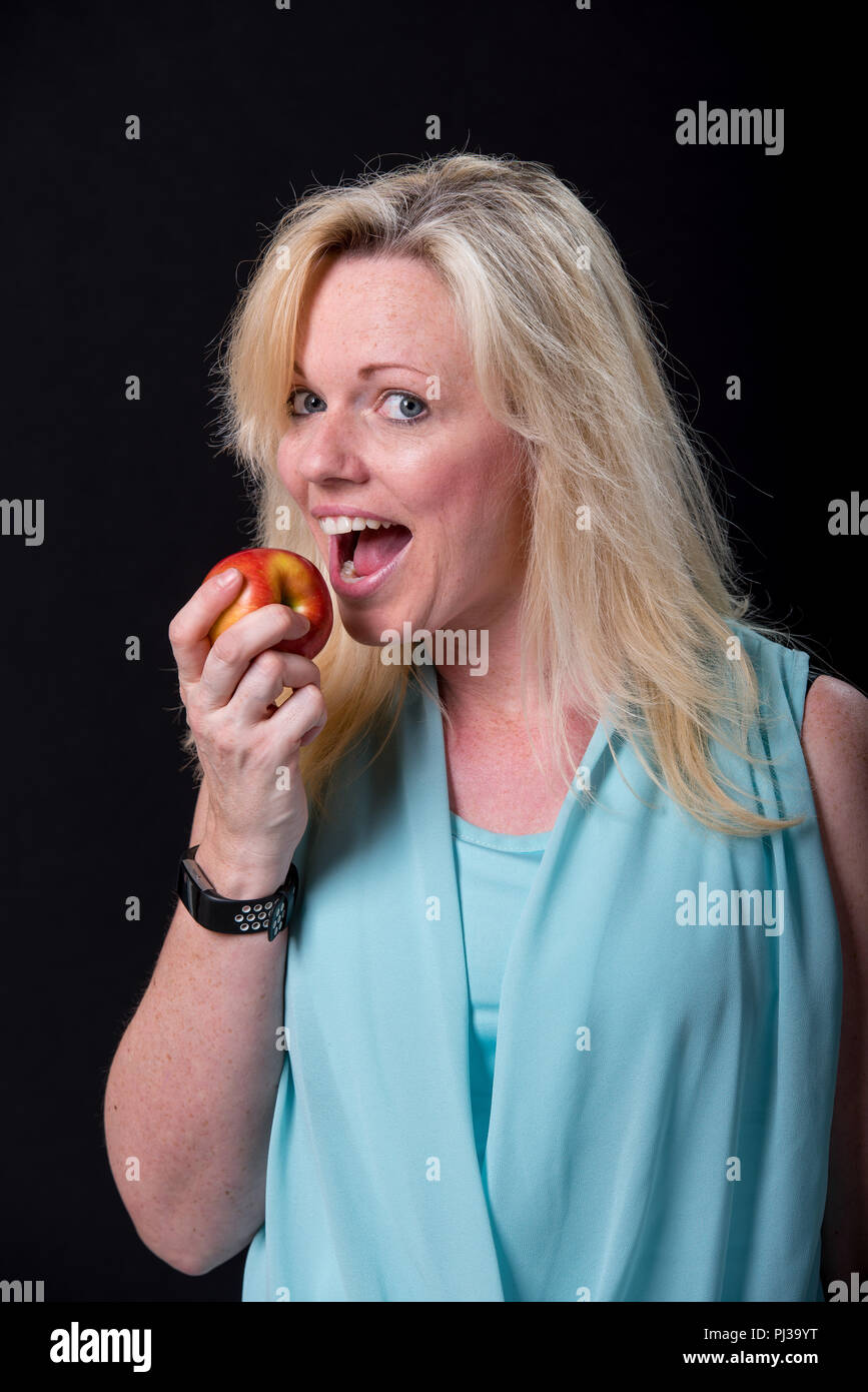 Eating an apple Stock Photo