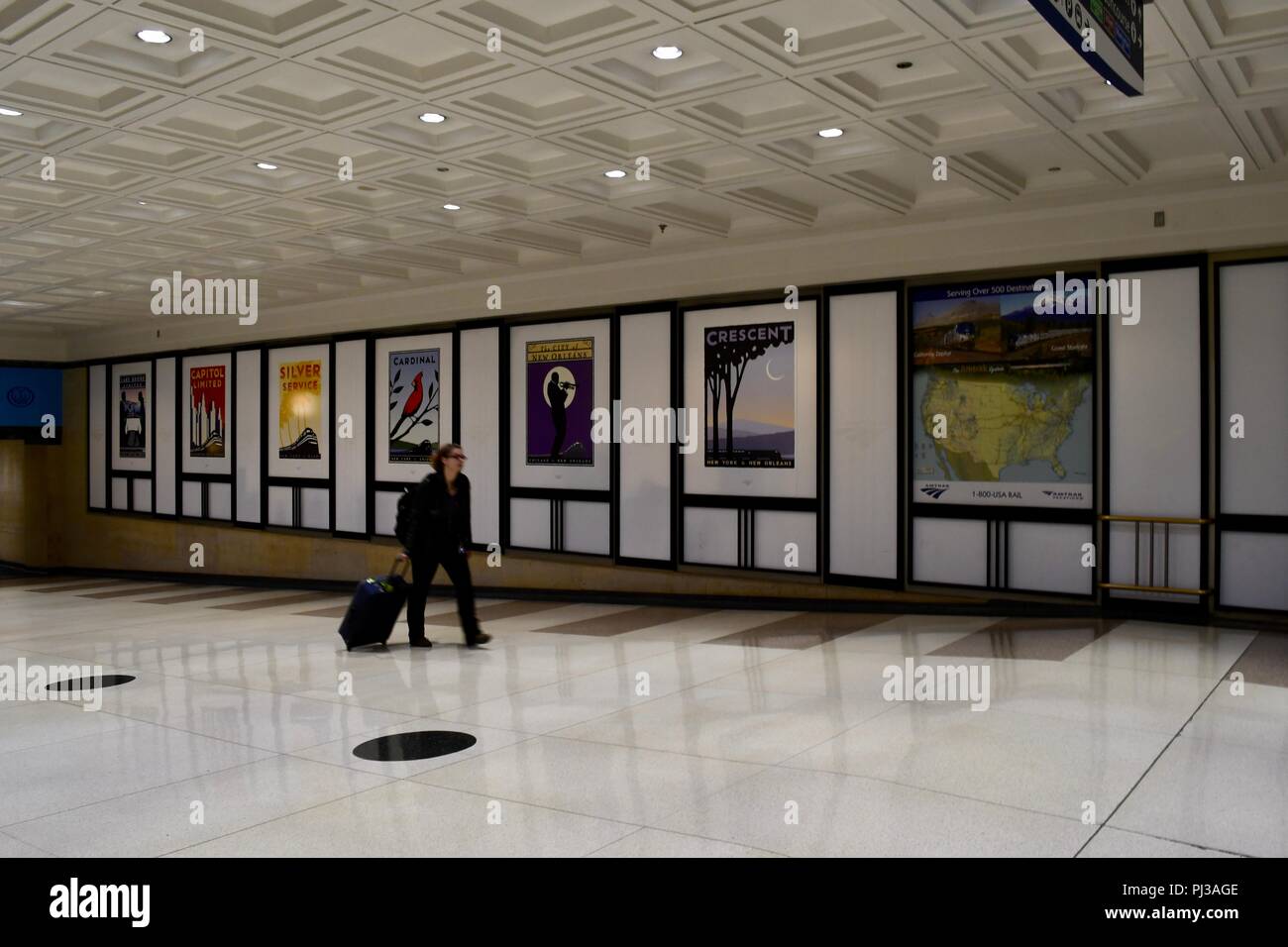 Passenger Dragging A Suitcase On Wheels Through Chicago’s Union Station ...