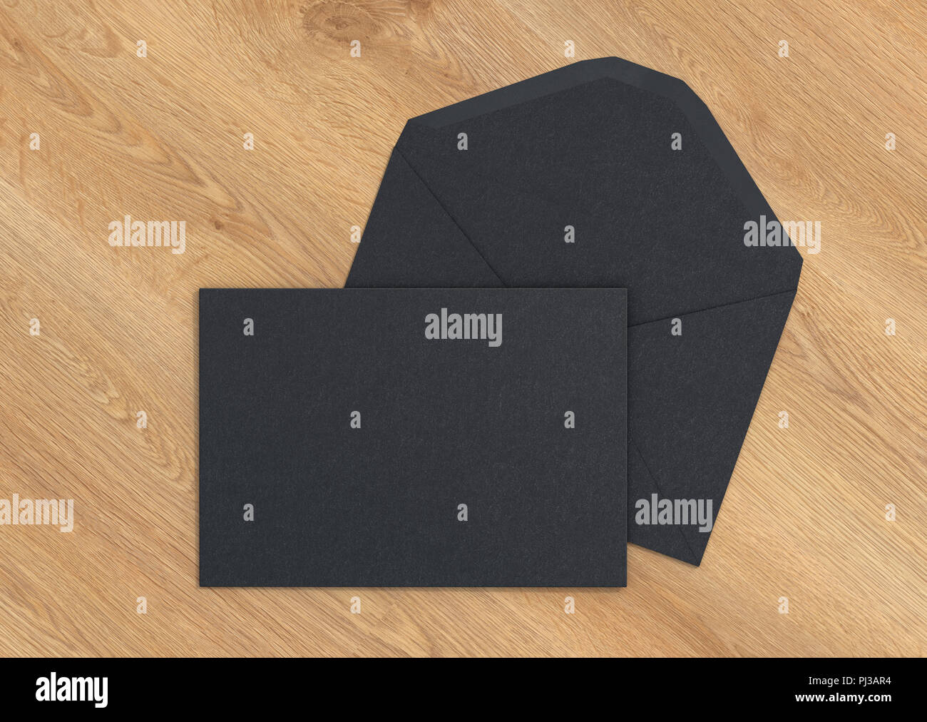 Black blank closed envelope on opened envelope on wooden background. 3d ...
