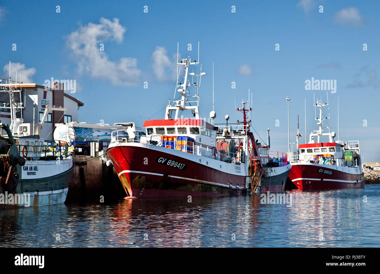 Trawlers at the quayside Stock Photo