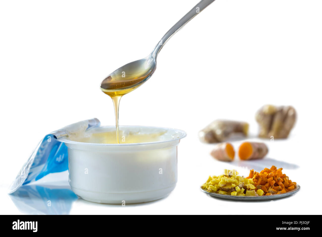 Honey Yogurt. Greek yogurt with honey in a pot with honey product Stock