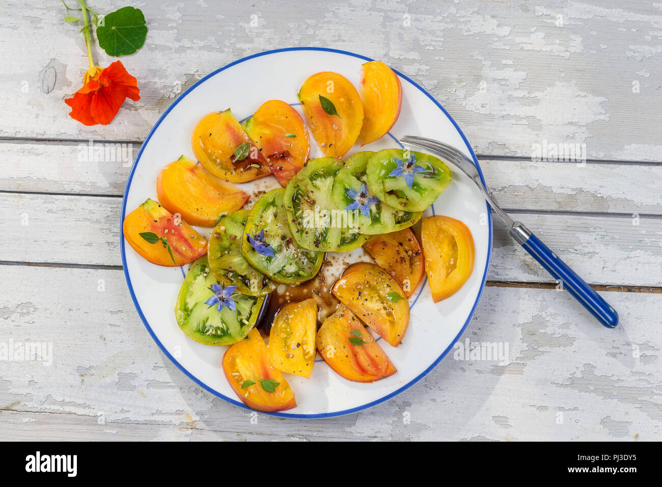 Ancient Tomatoes. Salad of various and colorful Ancient tomatoes Stock Photo