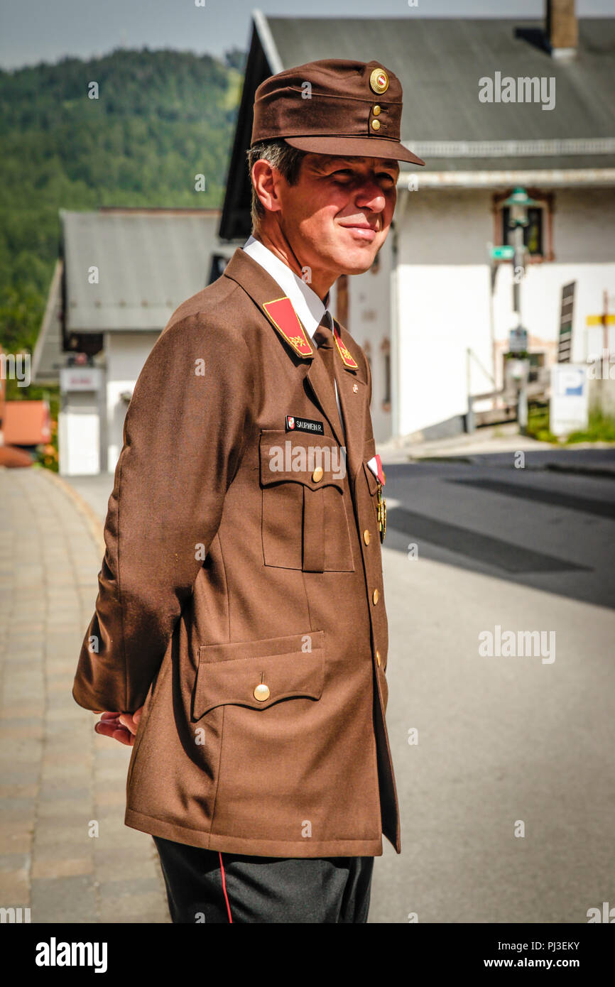 Member of the Fire Dept in his cerimonial uniform for sunday church service in Reith bei Seefeld, Austria Stock Photo