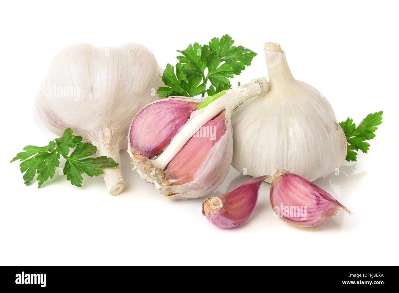 garlic with parsley leaf isolated on white background Stock Photo - Alamy