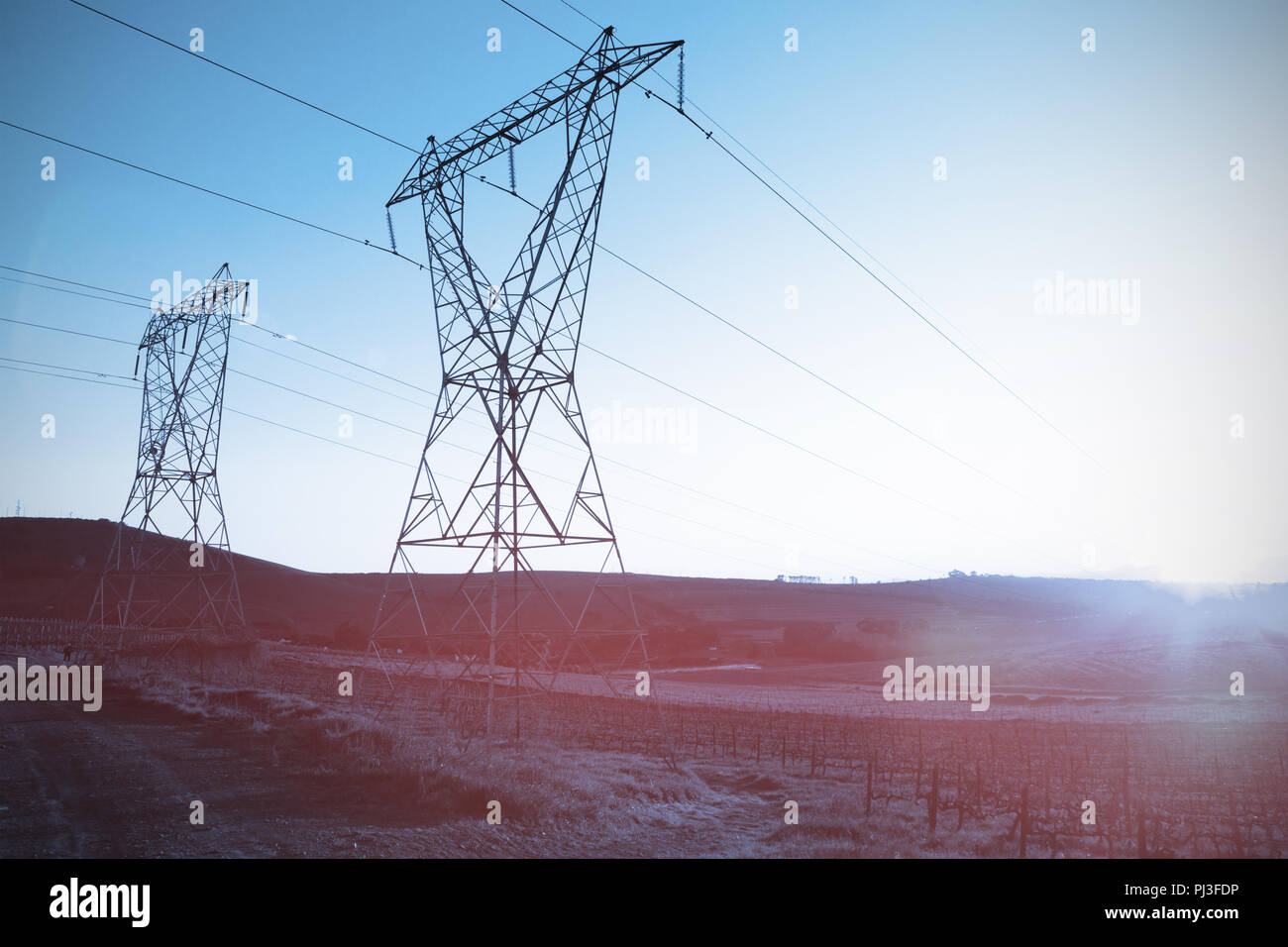 The evening electricity pylon silhouette Stock Photo - Alamy