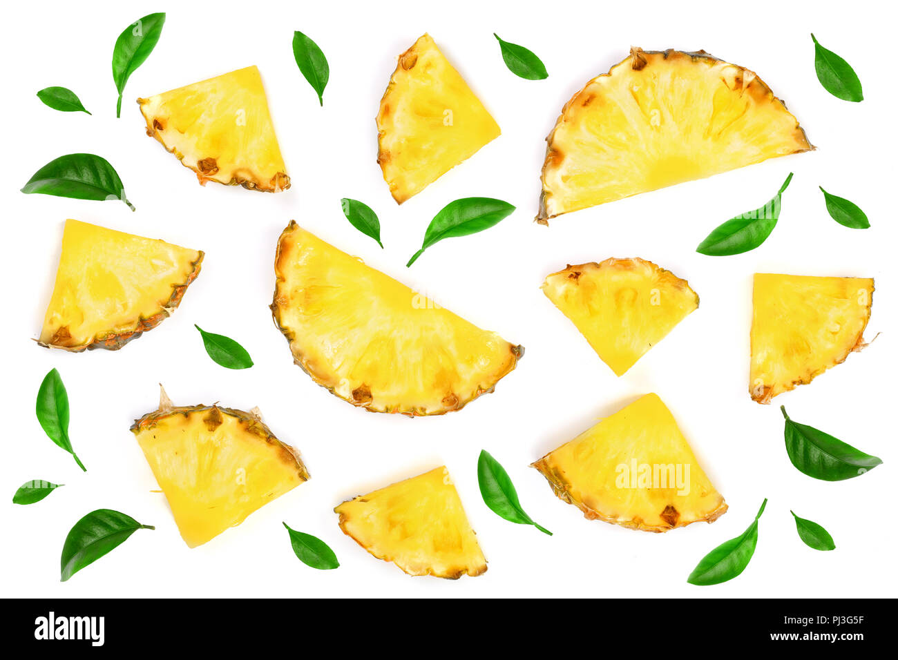 Sliced pineapple decorated with leaves isolated on white background ...