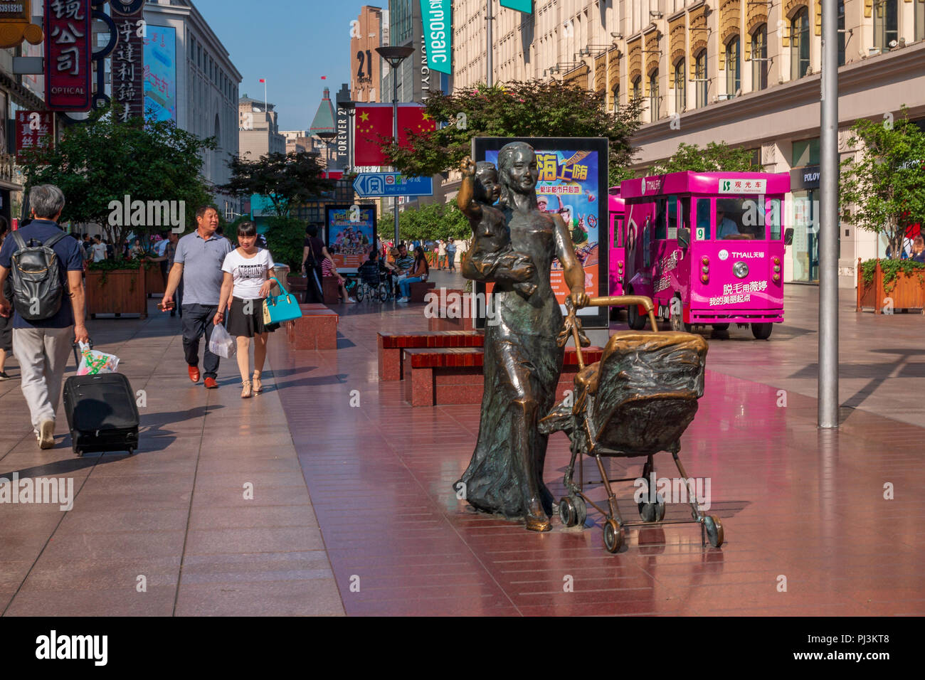 SHANGHAI, CHINA - MAY 17, 2018: Nanjing Road is the main shopping street in Shanghai and one of the world's busiest commercial streets. Stock Photo