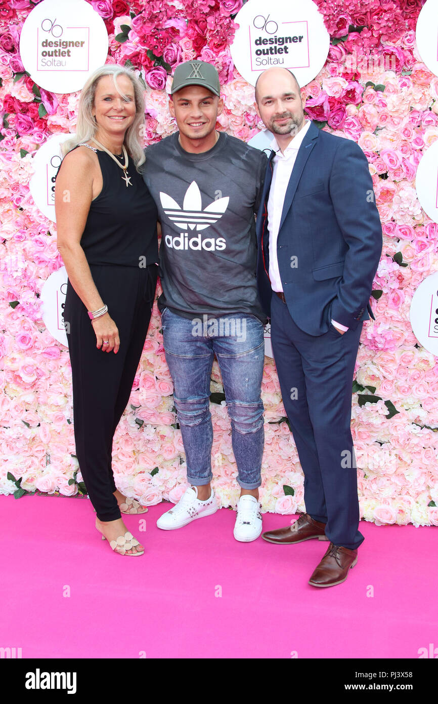 Late Night Shopping at Designer Outlet Soltau Featuring: Sylvie Mutschler,  Pietro Lombardi, Christian Antholz Where: Soltau, Germany When: 03 Aug 2018  Credit: Becher/WENN.com Stock Photo - Alamy