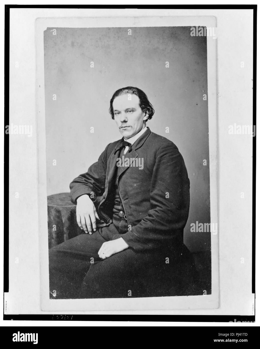 Aze Klein, three-quarter length portrait, seated, facing slightly left Stock Photo