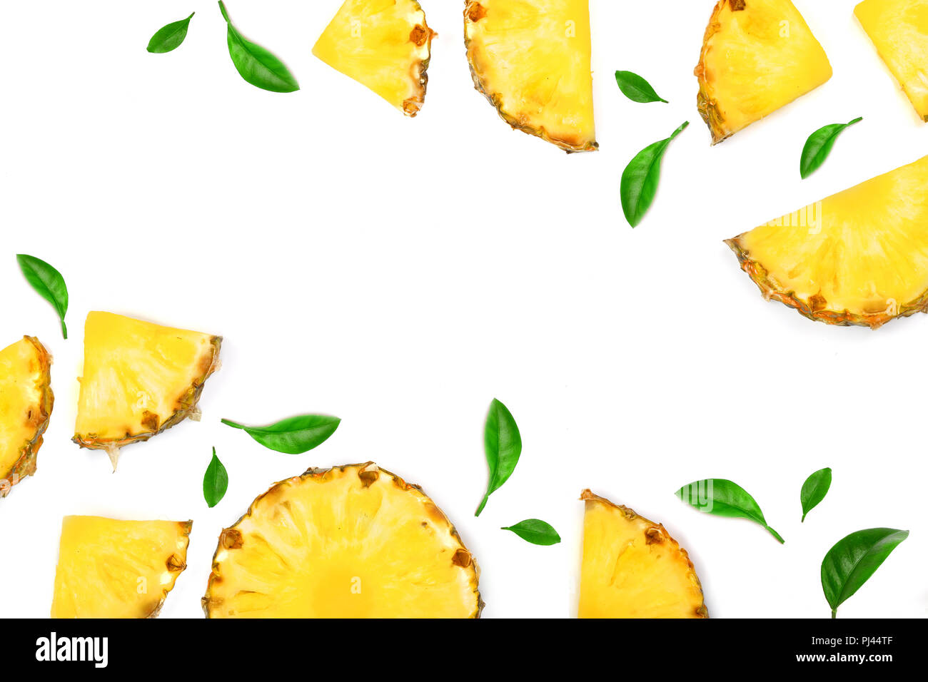 Sliced pineapple with leaf isolated on white background with copy space ...