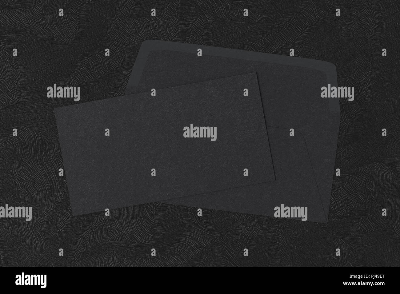 Black blank closed envelope on opened envelope on black background. 3d ...