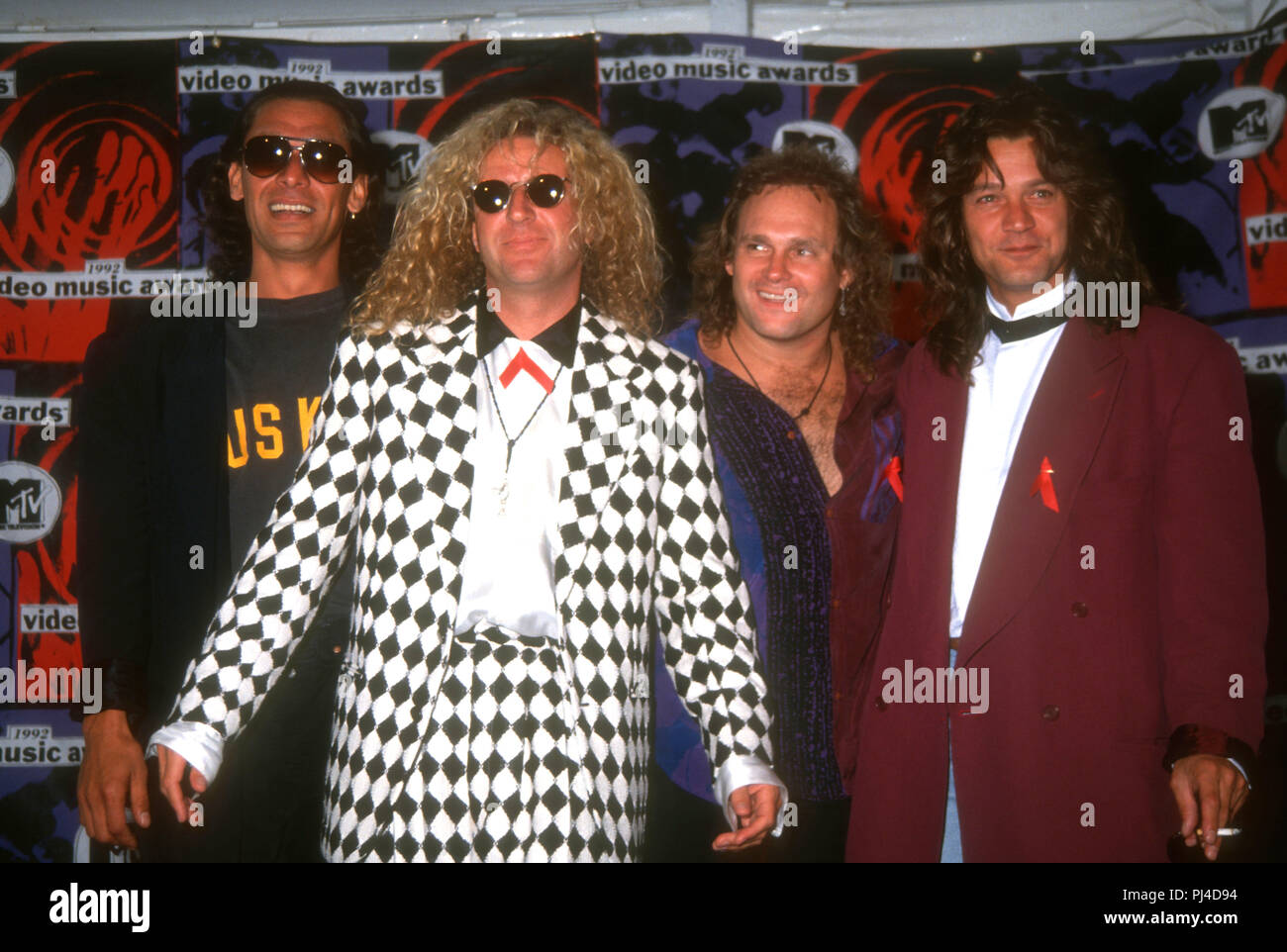 LOS ANGELES, CA - SEPTEMBER 9: (L-R) Musicians Alex Van Halen, Sammy Hagar, Michael Anthony and Eddie Van Halen of Van Halen attend the Ninth Annual MTV Video Music Awards on September 9, 1992 at Pauley Pavilion, UCLA in Westwood, Los Angeles, California. Photo by Barry King/Alamy Stock Photo Stock Photo