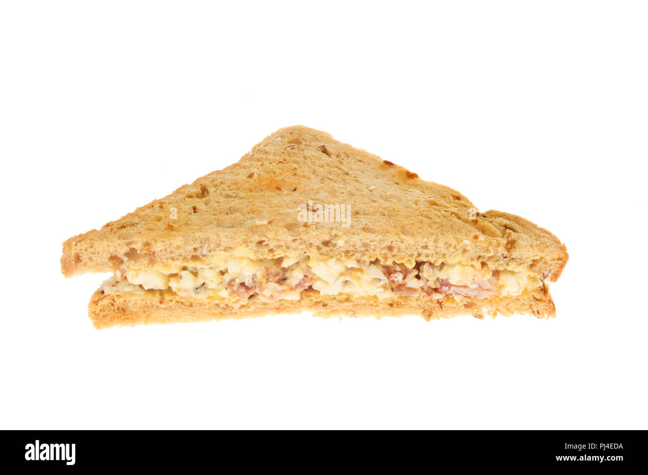 egg mayonnaise and bacon sandwich isolated against white Stock Photo
