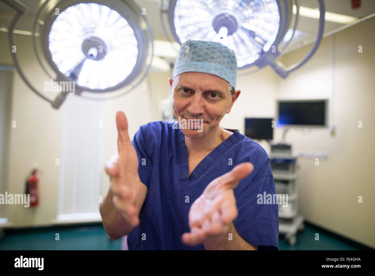 Embargoed to 0001 Wednesday September 5 Carlos Heras-Palou 53, an orthopaedic specialist surgeon at Derby Nuffield Hospital, who may have had his career saved by a new drug called 'Patisiran'. The rare disease, hereditary transthyretin-mediated amyloidosis (hATTR amyloidosis), progressed and destroyed the nerves in his hands, rendering them useless. However after an 18 month course of Patisiran the condition has halted and reversed. Stock Photo