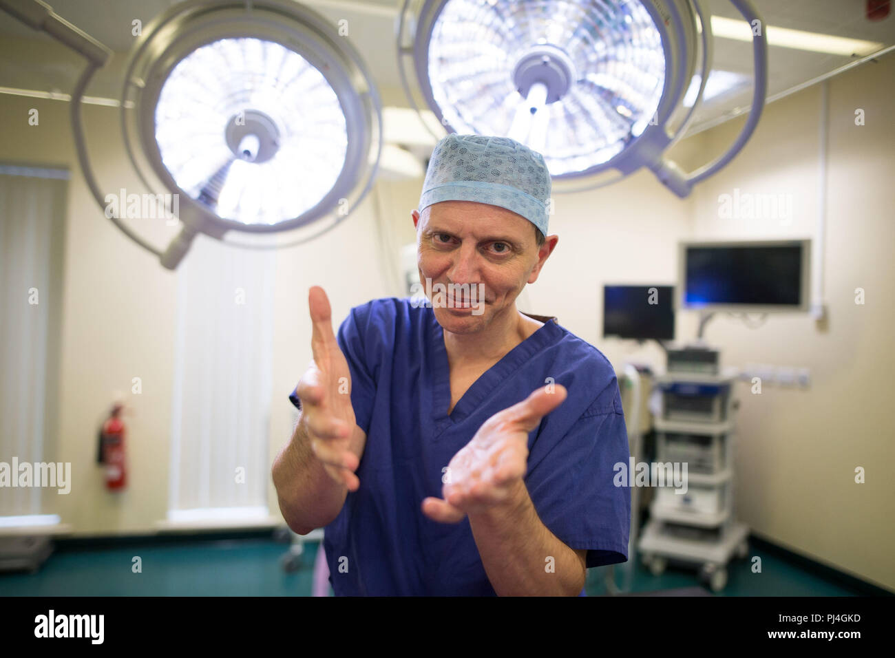 Embargoed to 0001 Wednesday September 5 Carlos Heras-Palou 53, an orthopaedic specialist surgeon at Derby Nuffield Hospital, who may have had his career saved by a new drug called 'Patisiran'. The rare disease, hereditary transthyretin-mediated amyloidosis (hATTR amyloidosis), progressed and destroyed the nerves in his hands, rendering them useless. However after an 18 month course of Patisiran the condition has halted and reversed. Stock Photo