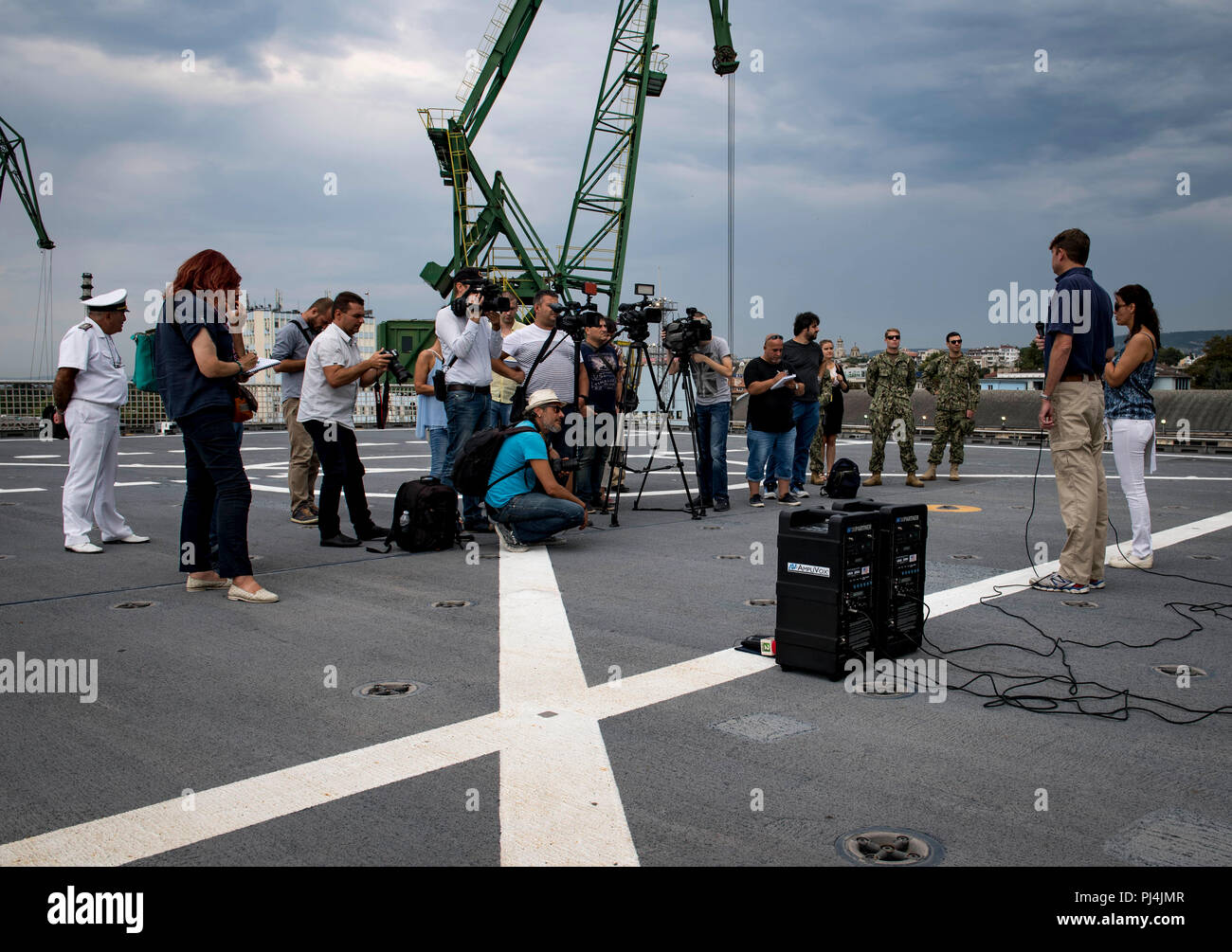 180828-N-RG482-169    VARNA, Bulgaria (Aug. 28, 2018) Civil service mariner Jonathan Keffer, second from right, civilian master of the Spearhead-class expeditionary fast transport ship USNS Carson City (T-EPF 7), speaks during a press event with Bulgarian media in Varna, Bulgaria, Aug. 28, 2018. Carson City is the seventh of nine expeditionary fast transport ships in Military Sealift Command's inventory with a primary mission of providing rapid transport of military equipment and personnel in theater via its 20,000 square foot reconfigurable mission bay area and seating for 312 passengers. (U. Stock Photo