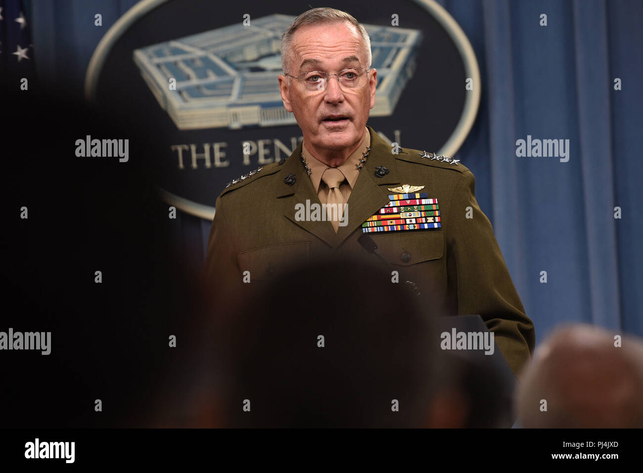 The chairman of the Joint Chiefs of Staff, Marine Corps Gen. Joseph F. Dunford, speaks at a joint press conference with U.S. Secretary of Defense James N. Mattis, at the Pentagon, Arlington, Va., Aug. 28, 2018. DoD photo by Lisa Ferdinando Stock Photo
