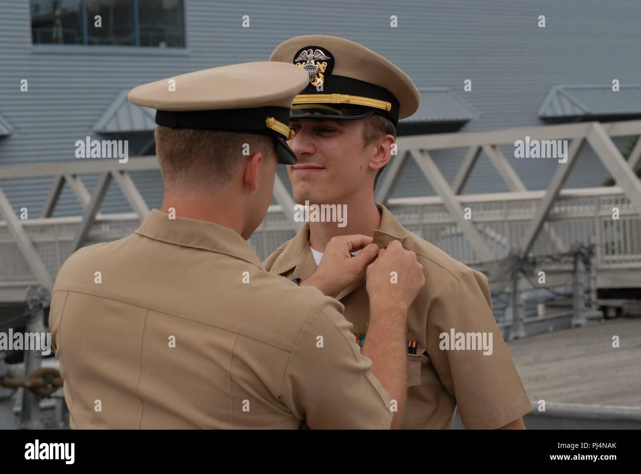 The Hampton Roads Naval Museum hosted a dual promotion ceremony aboard