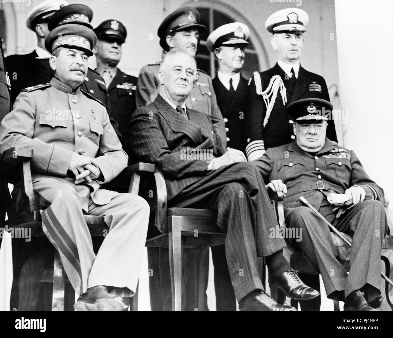 Tehran Conference.  Joseph Stalin (left), Franklin D. Roosevelt (centre) and Winston Churchill.  The conference was held from November 28 to December 1, 1943. The most important result from the agenda was an agreement that the Allies would open a second front against Nazi Germany. Stock Photo