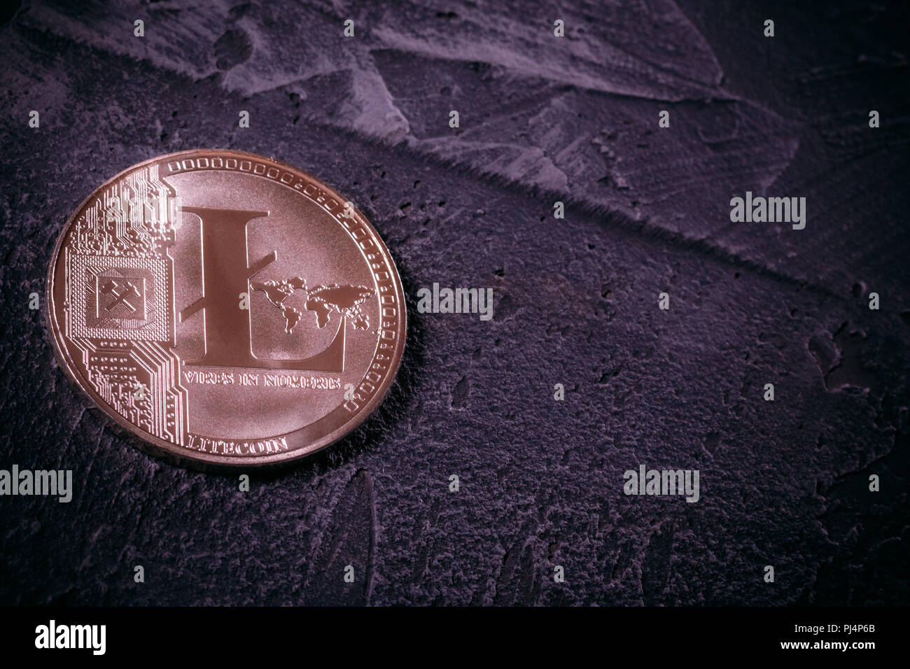 Crypto currency Litcoin LTC on a dark concrete background close-up with  copy space Stock Photo - Alamy