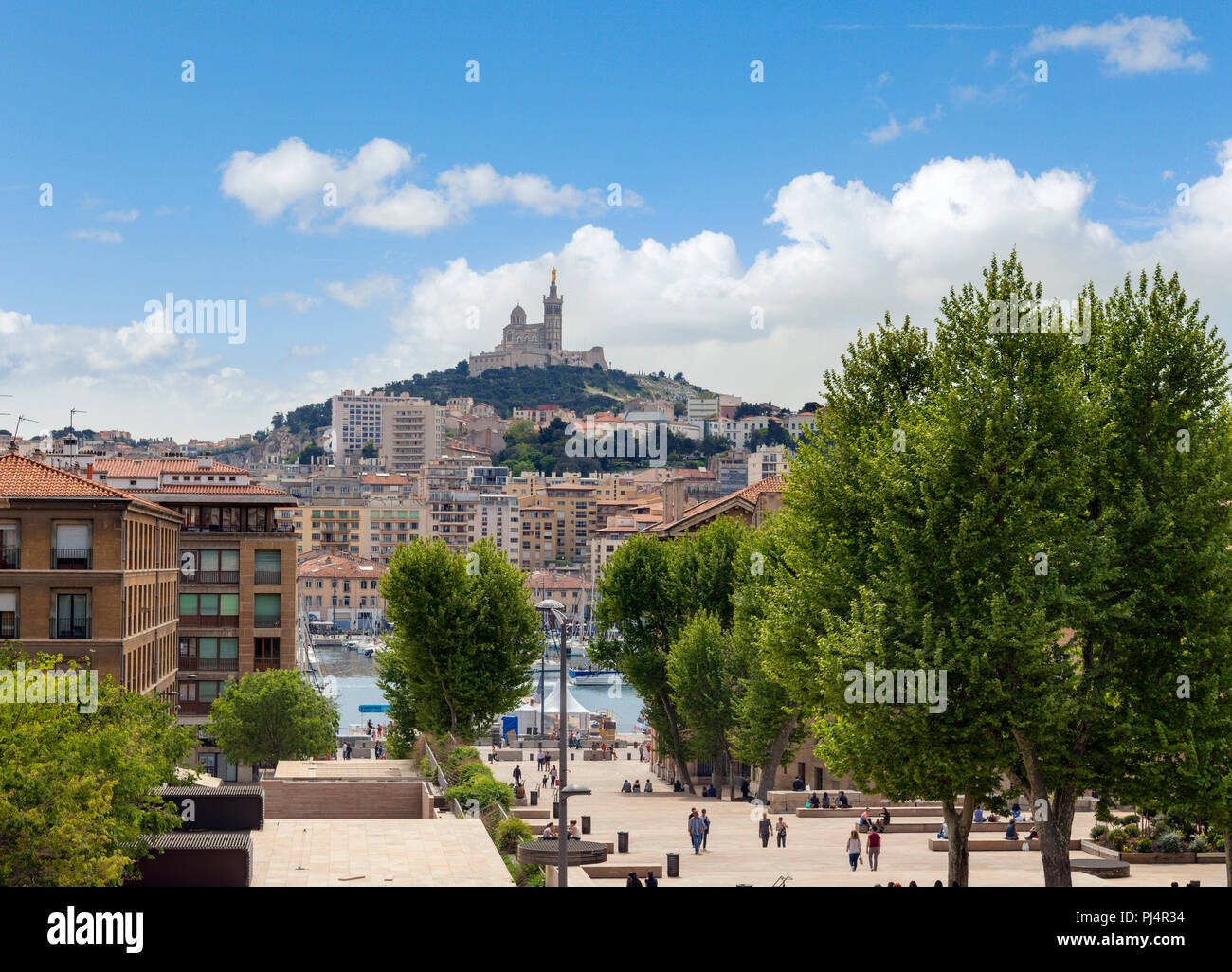 View over the old port towards the Basilique Notre-Dame de la Garde, Marseille, Provence-Alpes-Côte d'Azur, France Stock Photo