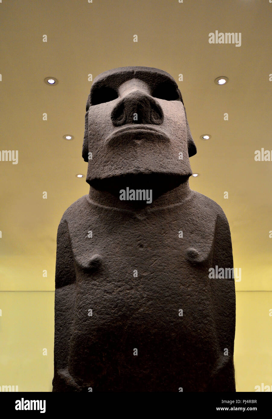 Easter Island basalt statue known as Hoa Hakananai'a (AD 1000-1200). British Museum, Bloomsbury, London, England, UK. [some objects digitally removed  Stock Photo