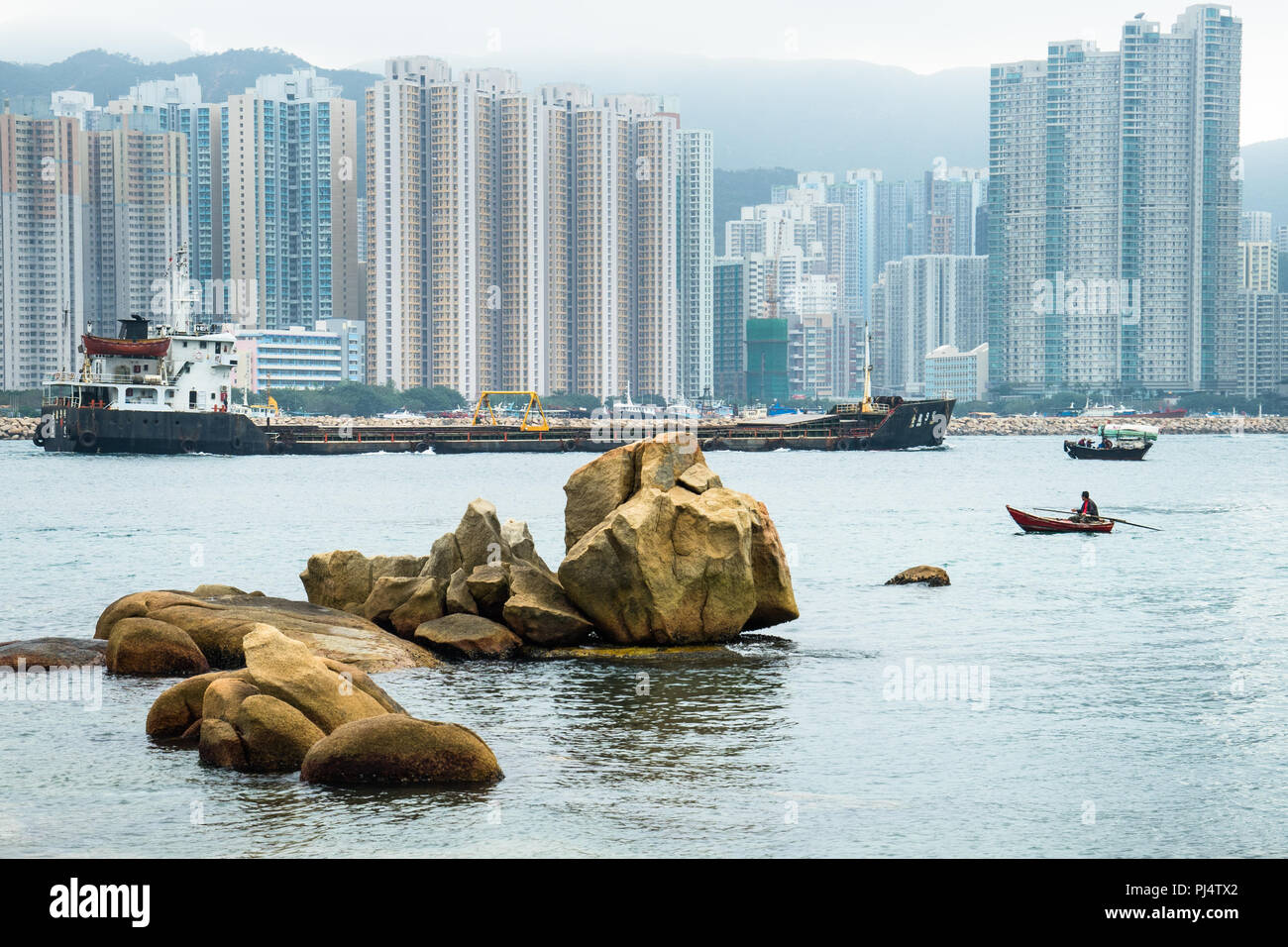 Shared waterway in Hong Kong Harbor, in Kwun Tong district of Hong Kong Stock Photo