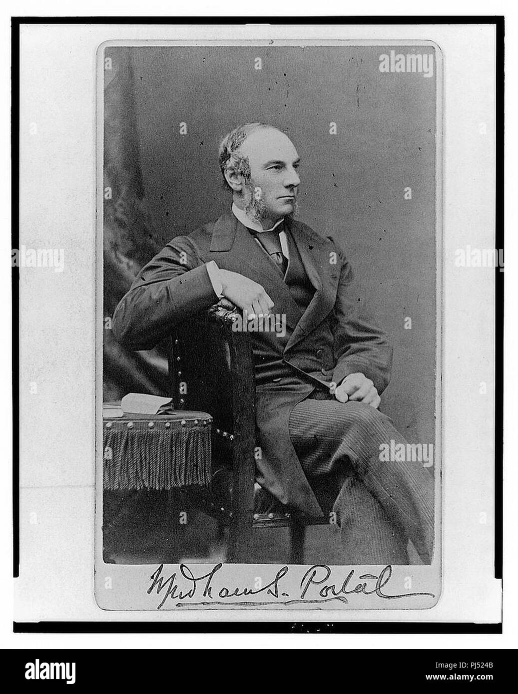 Baron Wyndham Spencer Portal, full-length portrait, seated, facing right) - Alexander Bassano Stock Photo
