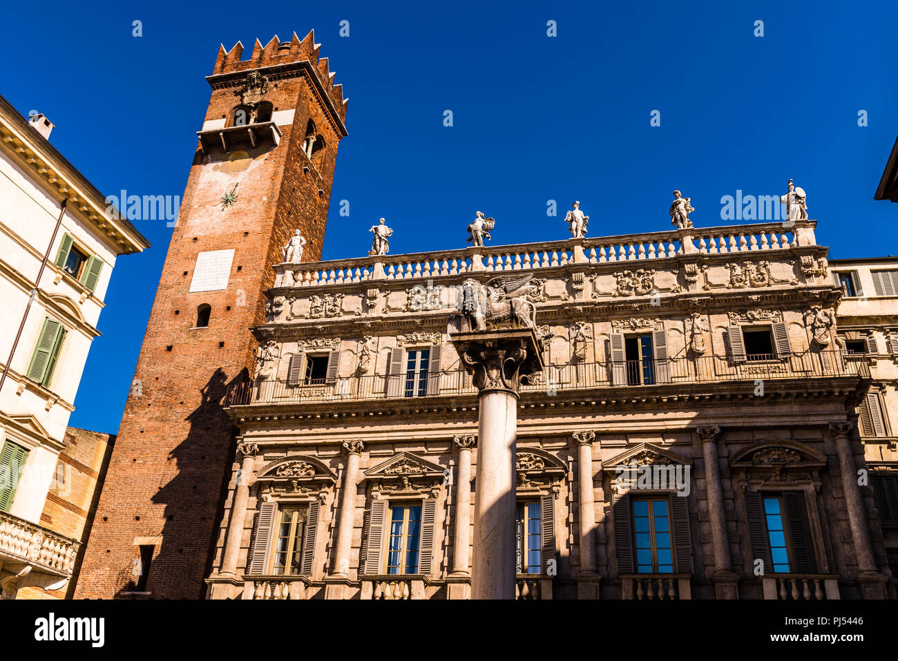 Palazzo Maffei against a dark blue sky in Piazza delle Erbe in Verona, Italy Stock Photo