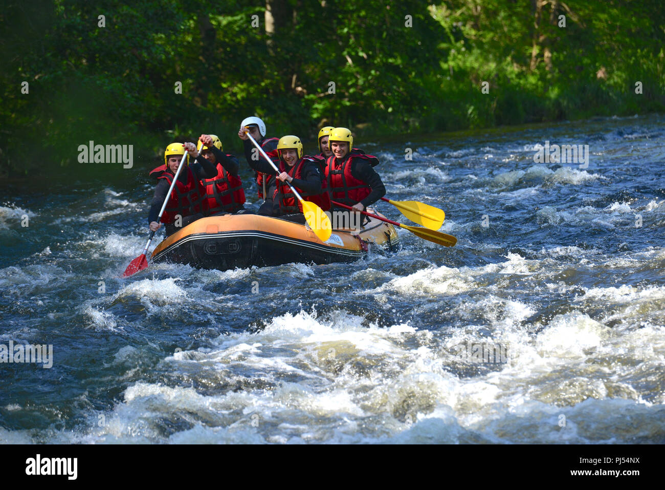 Rafting in the gorges of the Allier river from Monistrol-dÕAllier. Raft in the rapids Stock Photo