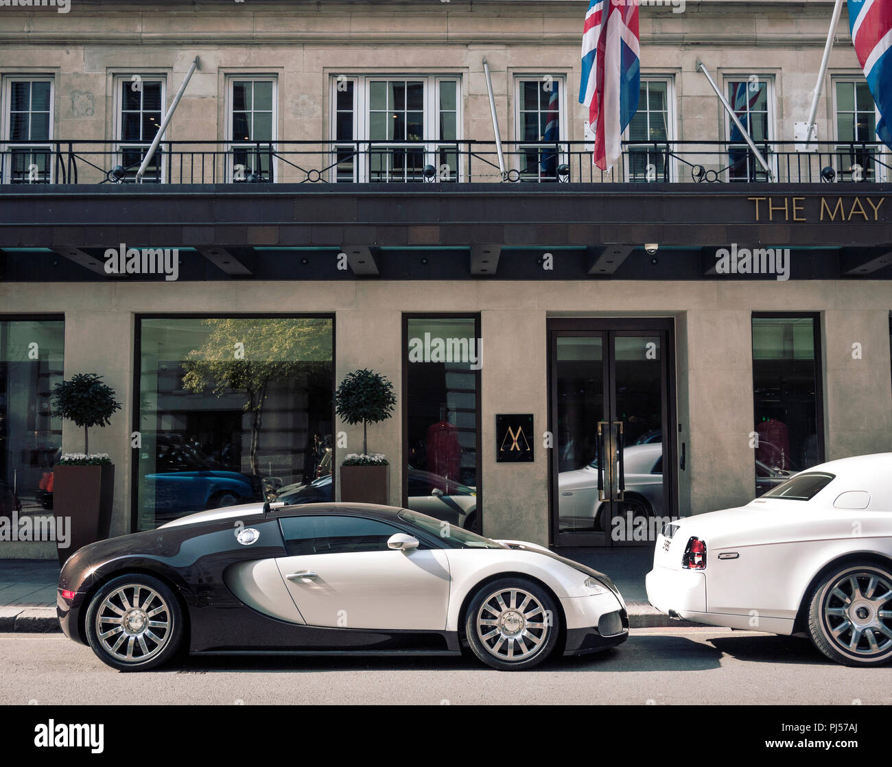 Bugatti Veyron and Rolls Royce Phantom outside The Mayfair hotel in London  UK Stock Photo - Alamy