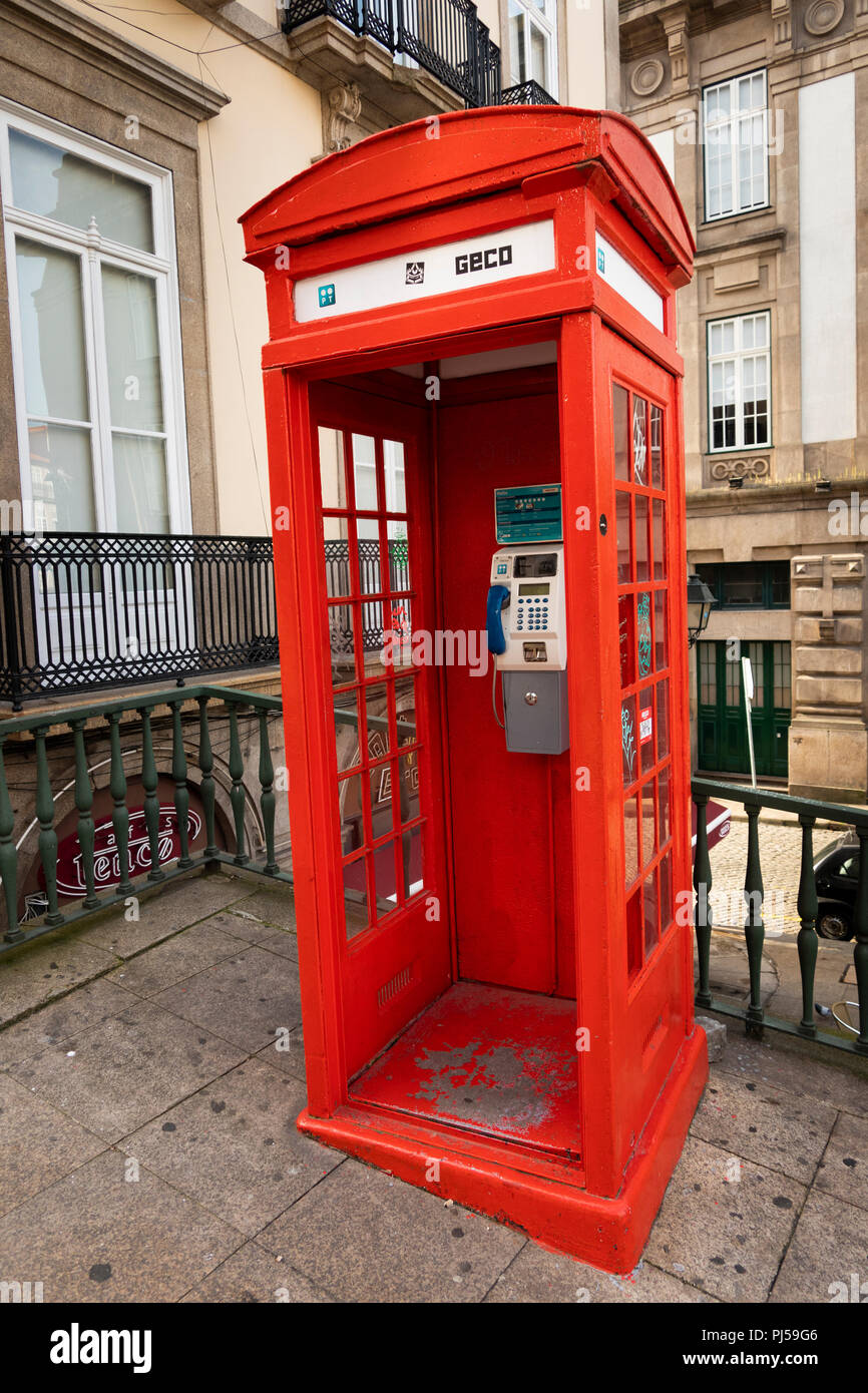 Portugal, Porto, Rua de Sa da Bandeira, historic British designed red K3 telephone kiosk Stock Photo